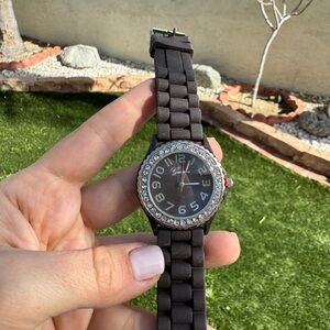 Geneva ladies black rubber band watch jeweled bezel